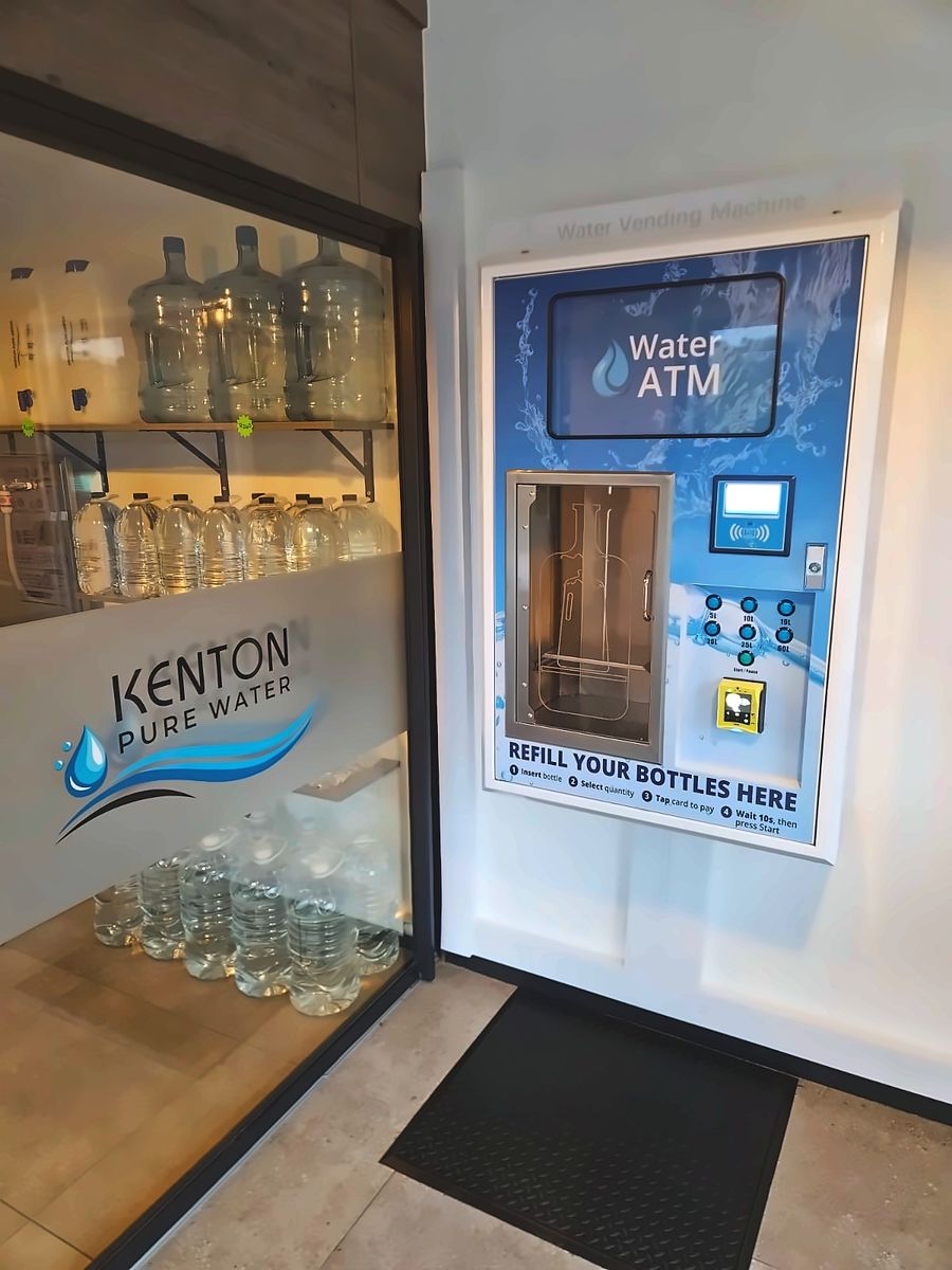 24-hour Water ATM at Kenton Pure Water, Kenton-on-Sea, with refill bottles on display